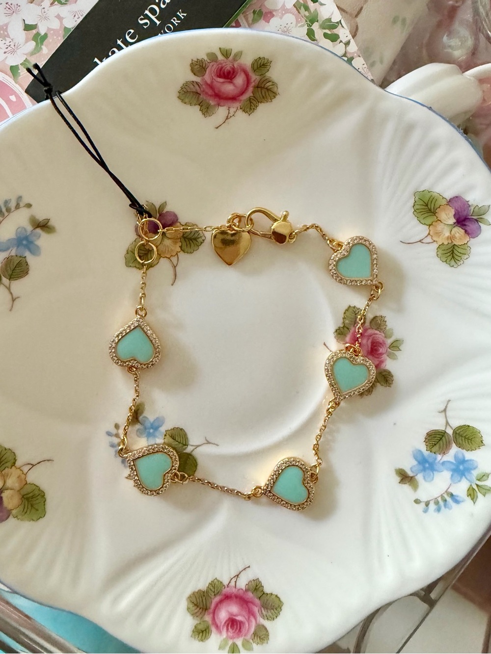 Kate Spade Gold Bracelet with Mint Heart Charms